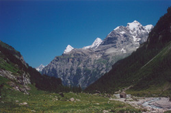Chilchbalm. Looking back from the end of the Lauterbrunnen Valley: Eiger, Monch, and Jungfrau.