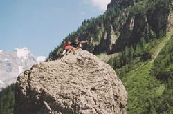 Mike and Alex on top of a boulder.