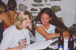 Amy and her friend checking out the guestbook