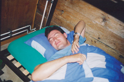 Alex is not responding to Jason's attempt to wake him up.