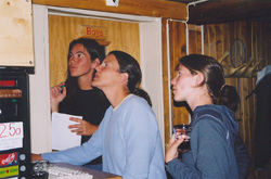 Nicola, Sarah, and Steph are checking out train schedules on the Internet.